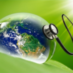 Green background with earth as viewed from space with a stethoscope listening to its heartbeat